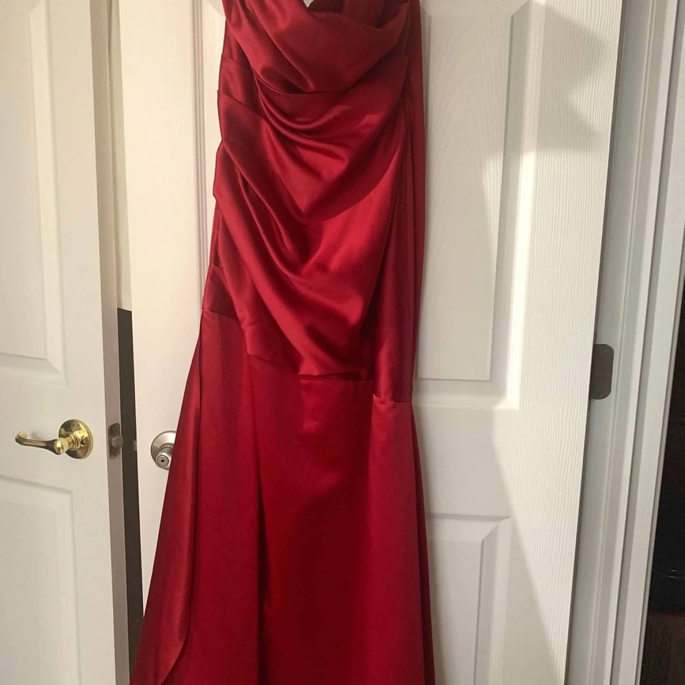 Worn once at a wedding-the pink strap has been removed